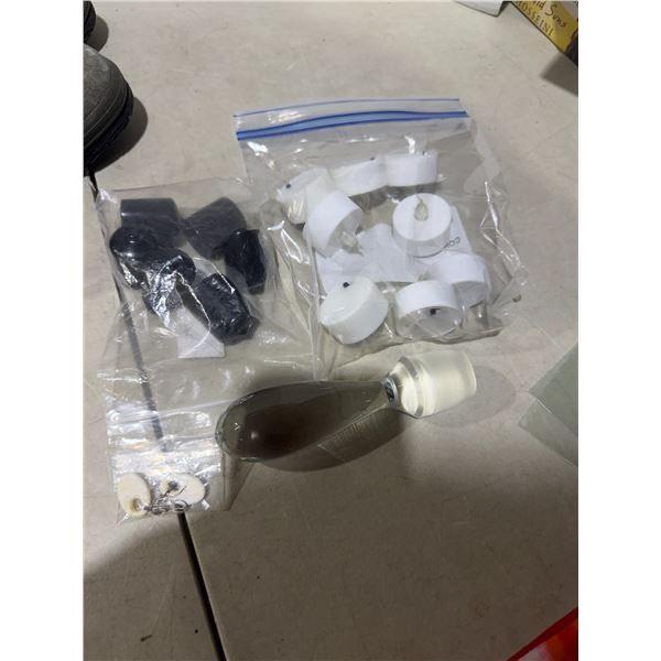 Rubber chair, tips or cane tips, tea, lights, bottle, stopper, and earrings