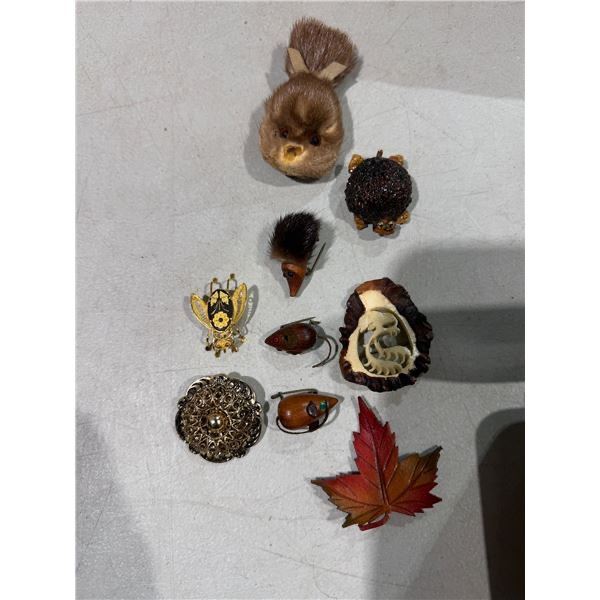 Assorted costume jewelry brooches