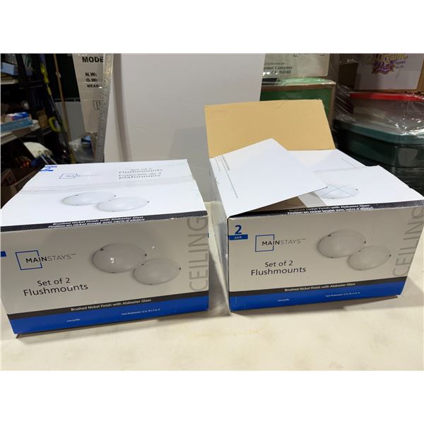 Two boxes with three light fixtures