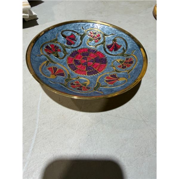 vintage brass enamel decorative bowl features floral designs in red, blue, and purple tones, typical