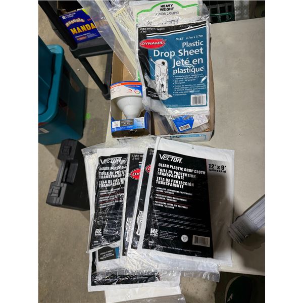 Plastic drop sheets, light bulb, and zip ties