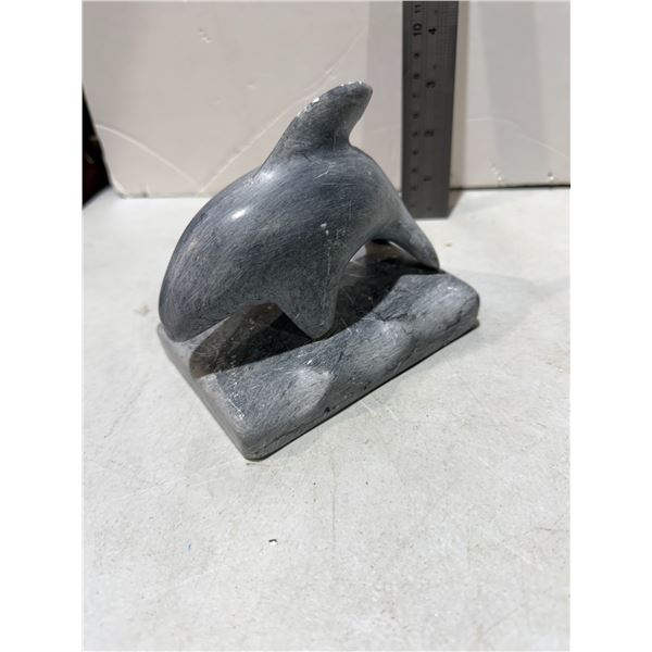 Carved dolphin