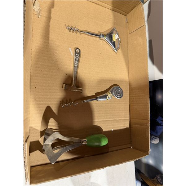 Vintage kitchen items, cork screws, toffee, hammer, and other item