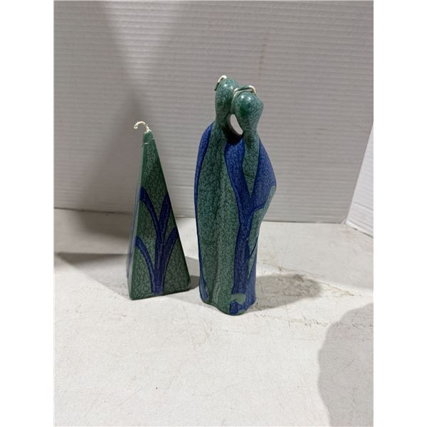 vintage figural candles designed in a modern, abstract style with green and blue marbled wax.