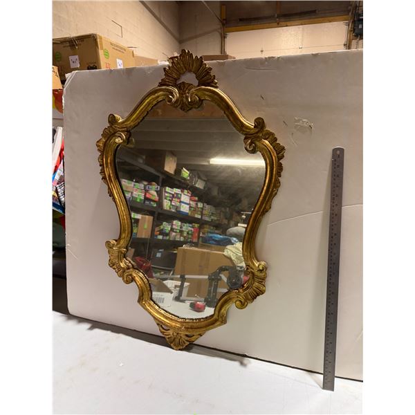 Ornate mirror measure 35 inches tall by 23 inches wide