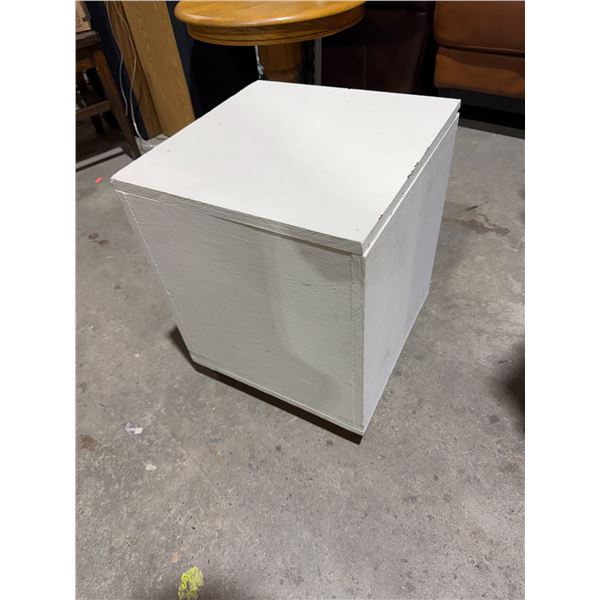 Storage box on wheels measures 16 1/2" x 16 1/2" and a half inches tall