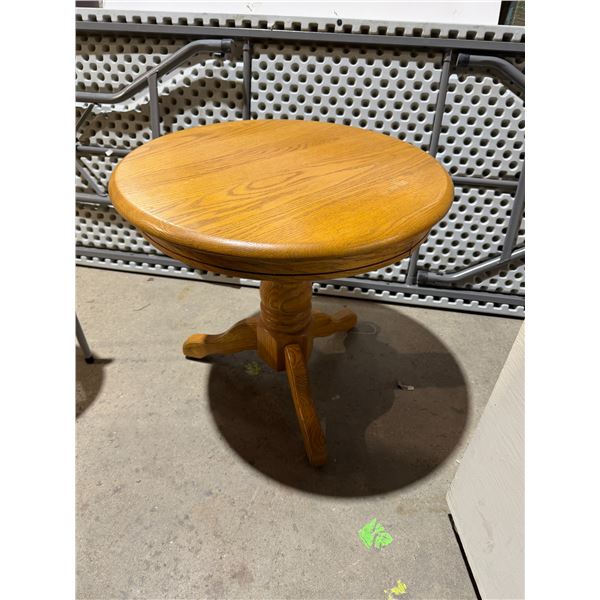 Pedistal side table measures 24" x 22"