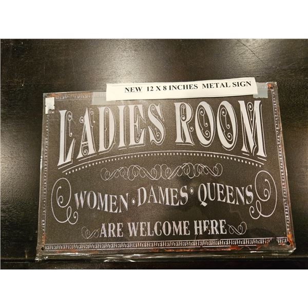 Metal sign "ladies room"