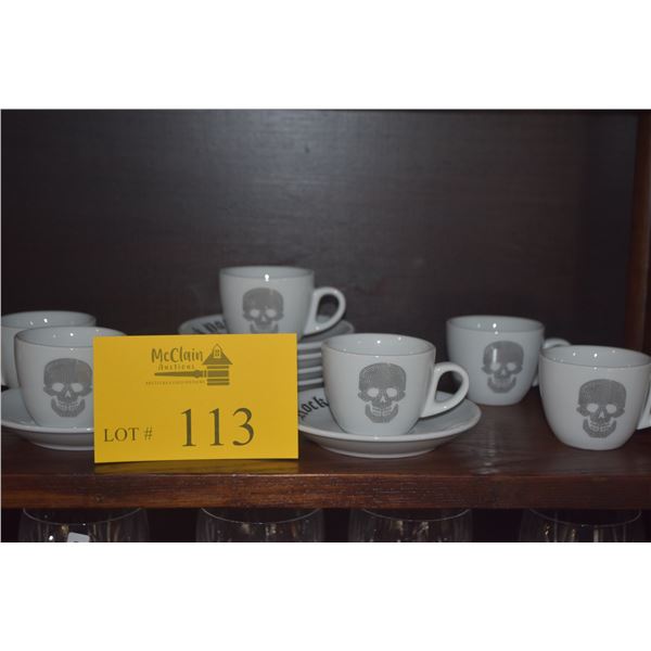 CHRISTIAN AUDIGIER PORCELAIN TEA CUPS & SAUCERS SET W/SKULL MOTIF & "ROCK YOUR LIFE" TEXT (SET OF 6)