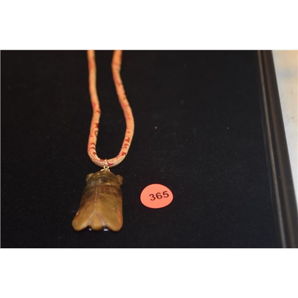MING'S CARVED CICADA PENDANT ON SILK CORD W/14K BALE & CLASP