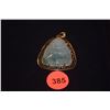 Image 1 : 14K CARVED JADE PENDANT