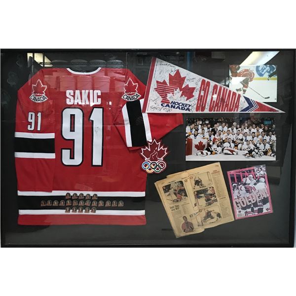 LARGE CUSTOM FRAMED TEAM CANADA SIGNED COLLAGE (JOE SAKIC SIGNED JERSEY AND TEAM SIGNED PENANT)