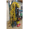 Image 1 : ASSORTED ITEMS INCLUDING; HEAVY DUTY EXTENSION CORDS, PRESSURE WASHER HOSE, JUMPER CABLES & MORE