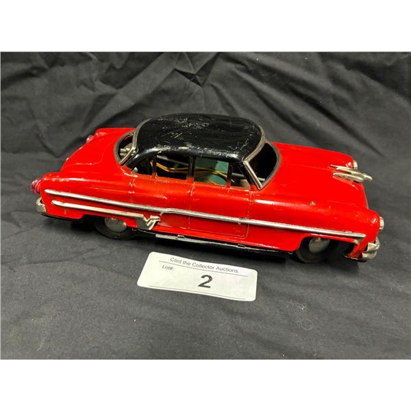Metal battery operated toy car Modern Toys Japan 1950s 8"