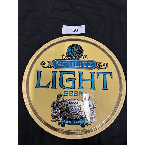 Vintage Schlitz light beer sign 11" dia
