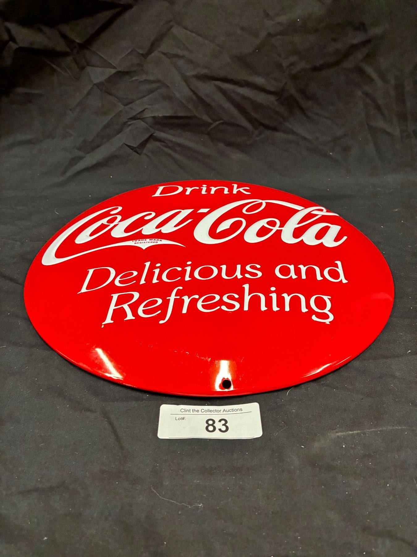 Mint condition embossed metal Coca-Cola button sign, made by Coke, 14