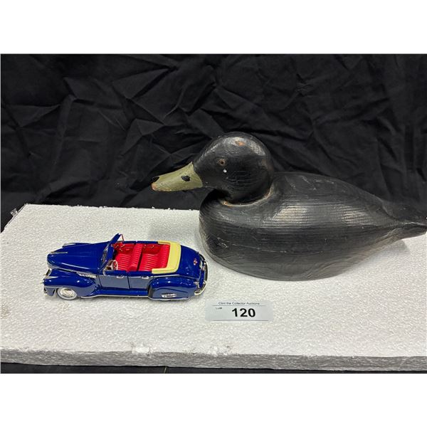 Wooden duck decoy & 1941 Buick Roadmaster die cast car