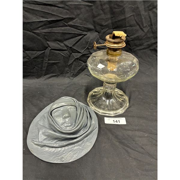 Vintage kerosene lamp and leather art