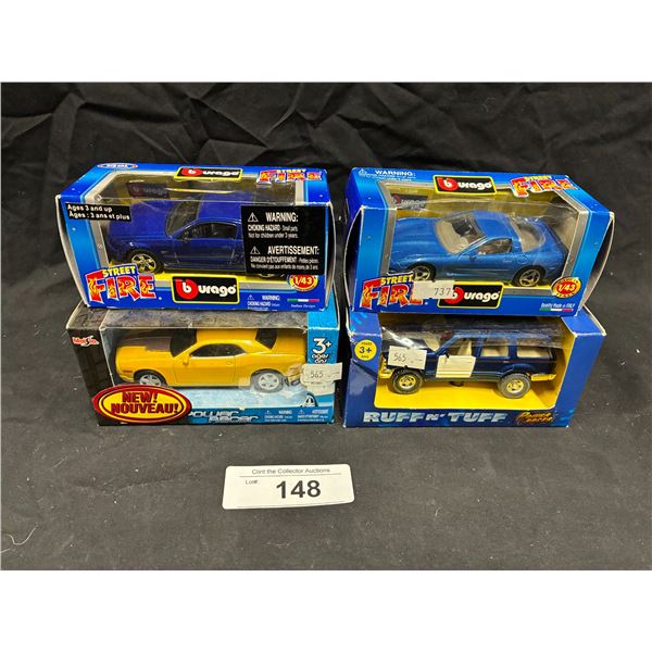 4 NIB die cast cars