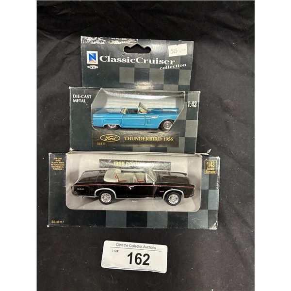 2 1:43 scale die cast cars