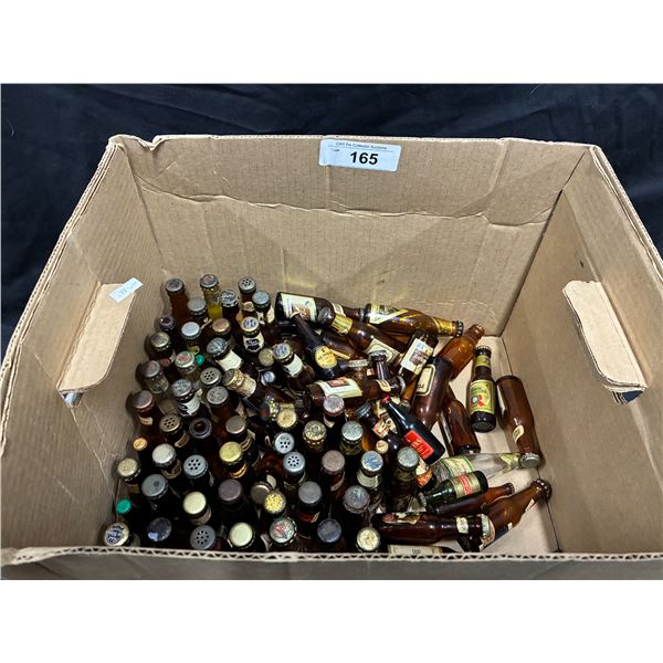 Approx 100 miniature liquor bottles, some full, some empty
