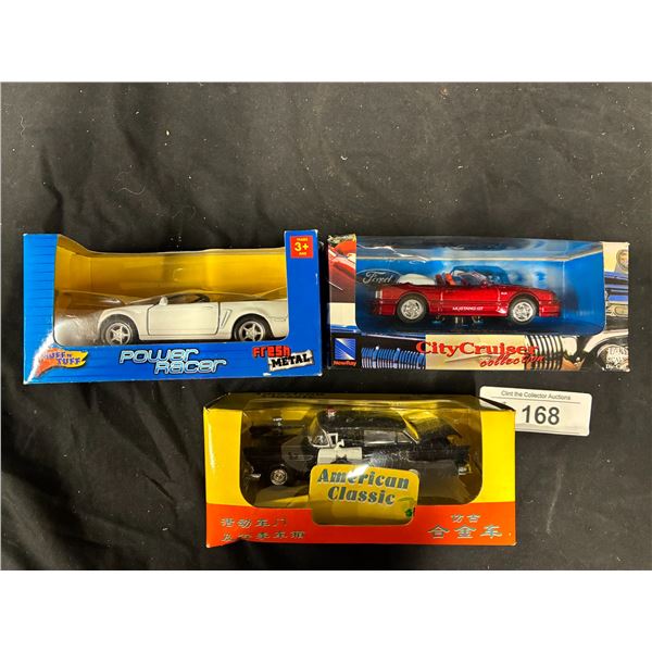 3 1:43 scale die cast cars