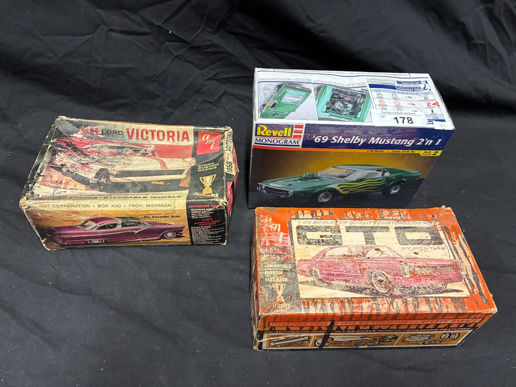 3 vintage model kit boxes with various pieces inc NIB Shelby Mustang