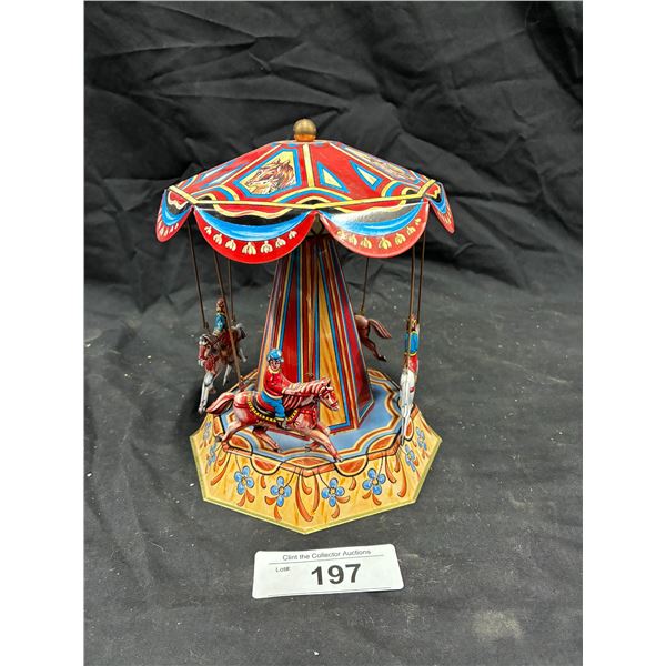 German made tin carnival carousel toy approx 8" tall