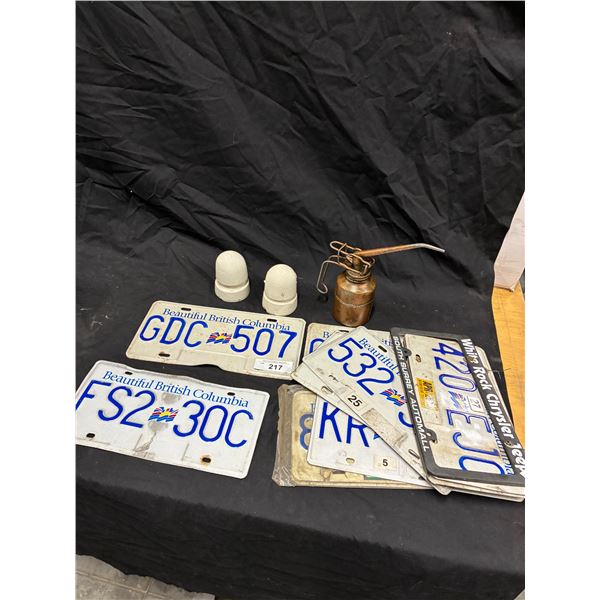 Collectable lot inc insulators, oiler & 12 BC license plates