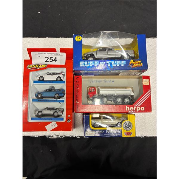 6 vintage die cast vehicles NIB