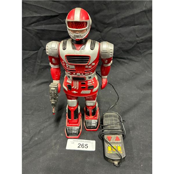 Vintage robot/spaceman toy with remote controle 10"
