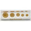 Image 4 : Gold Maple Leaf Uniface Lucite Replica Set from the Royal Canadian Mint