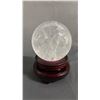 Image 1 : 4" QUARTZ SPHERE ON ROTATING WOOD STAND