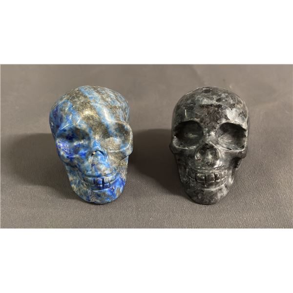 (2) CARVED SKULLS: SODALITE & LARVIKITE: APPROX. 1.5" TALL