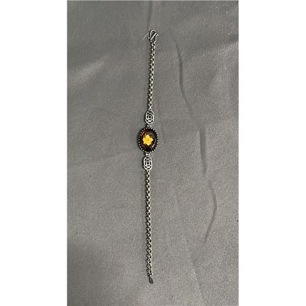 .925 SILVER BRACELET WITH CARVED OVAL AMBER STONE