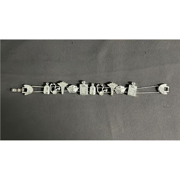 VINTAGE 1995 TOFA SLIDE CHARM BRACELET