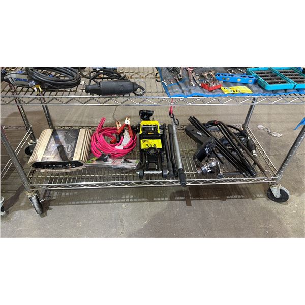 SHELF OF ASSORTED TOOLS INCLUDING HYDRAULIC JACK, HEAVY DUTY JUMPER CABLES, TRAILER HITCH AND MORE