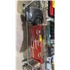 Image 1 : SHELF OF ASSORTED ITEMS INCLUDING TOOL BOX AND HOSE AND CAR MATS