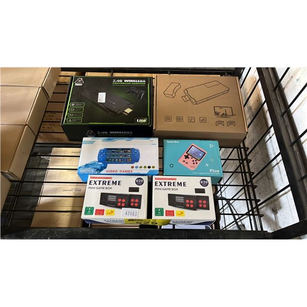 (2) SETS OF WIRELESS GAME CONTROLLERS & (4) ASSORTED PORTABLE MINI GAME CONSOLES
