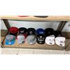 Image 1 : SHELF OF ASSORTED HATS INCLUDING; OAKLAND RAIDERS, ORLANDO MAGIC, SEATTLE SEAHAWKS & MORE