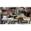 Image 1 : SHELF OF ASSORTED BOOKS, GLOVES, FLAT BUNGEE CABLES, COOLING TOWEL, ASSORTED CABLES & MORE