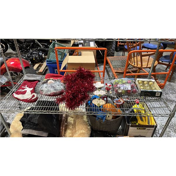 SHELF OF CHRISTMAS STOCKINGS, GARLAND & ORNAMENTS