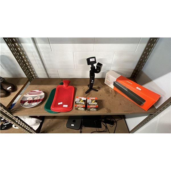 CHRISTMAS PLATE, (2) HOT WATER BOTTLES, OIL FILTERS, MINI CELL PHONE TRIPOD & ANOVA VACUUM SEALER