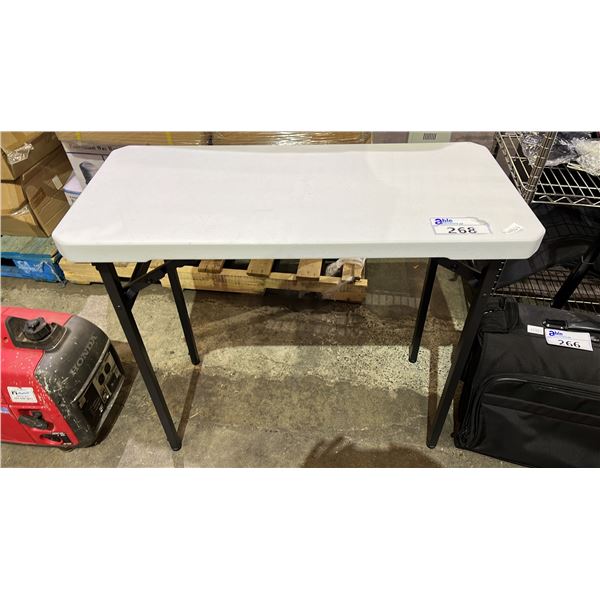 SMALL FOLDING TABLE: 34"W X 30"T X 15.75"D