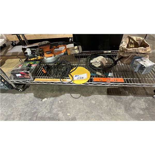 SHELF OF ASSORTED TOOLS: SANDER, BUBBLE LEVELS, SANDING DISCS, BATTERY TESTER JUNIOR & MORE