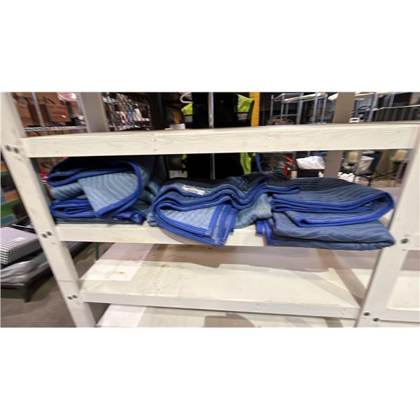 SHELF OF MOVING BLANKETS