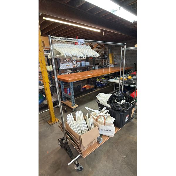 ROLLING METAL CLOTHES RACK & OVER 100 PLASTIC HANGERS