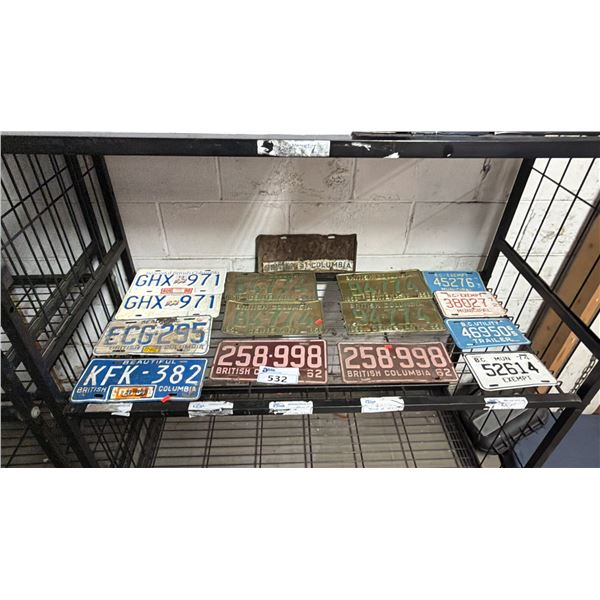 SHELF OF ASSORTED VINTAGE BC LICENSE PLATES