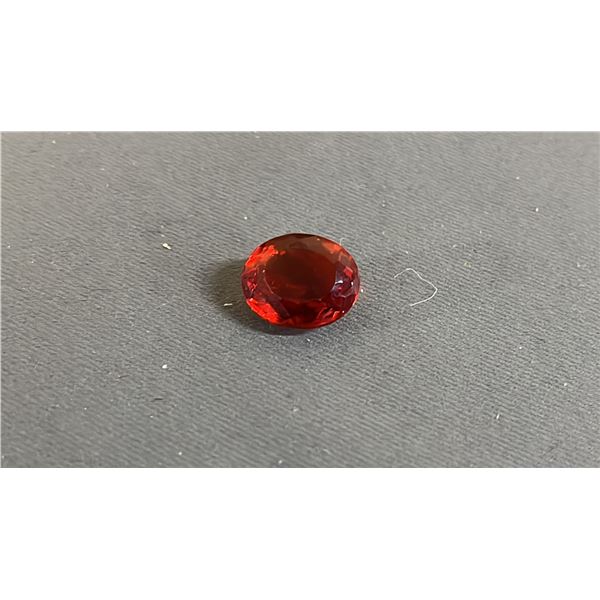 OVAL CUT RED GEMSTONE