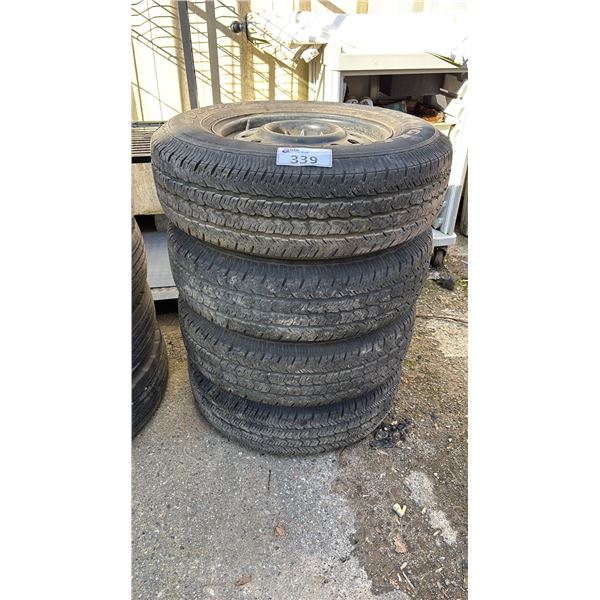 SET OF 4 GOODYEAR WRANGLER ST P225/75R16 TIRES MOUNTED ON 10 BOLT METAL RIMS